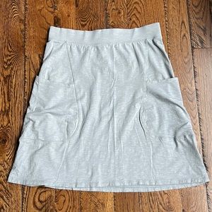 Horny Toad, organic cotton, a line skirt in very pale celery green. Size medium.